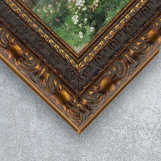 A canvas print hung behind in a foyer, behind a couch.