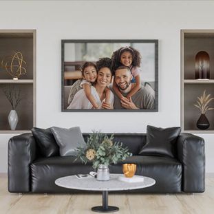 Large family portrait above sofa