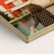 Wooden photo print with vintage travel images.