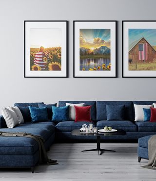 3 framed patriotic photographs in black frames in a living room with red, white and blue accents